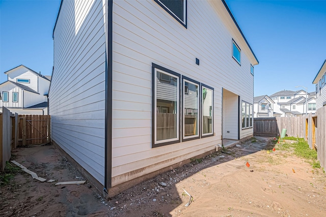 view of property exterior featuring a fenced backyard