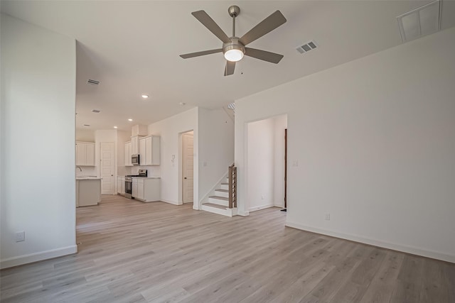 unfurnished living room featuring ceiling fan, light wood-style flooring, visible vents, recessed lighting, and baseboards