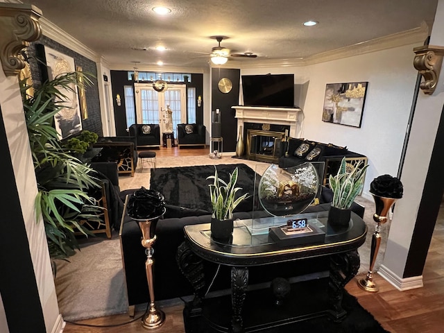 3226 Blackcastle Dr, Houston, TX 77068 - living area with baseboards, wood finished floors, a ceiling fan, and ornamental molding