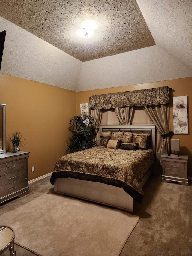 3226 Blackcastle Dr, Houston, TX 77068 - carpeted bedroom featuring lofted ceiling, a textured ceiling, and baseboards