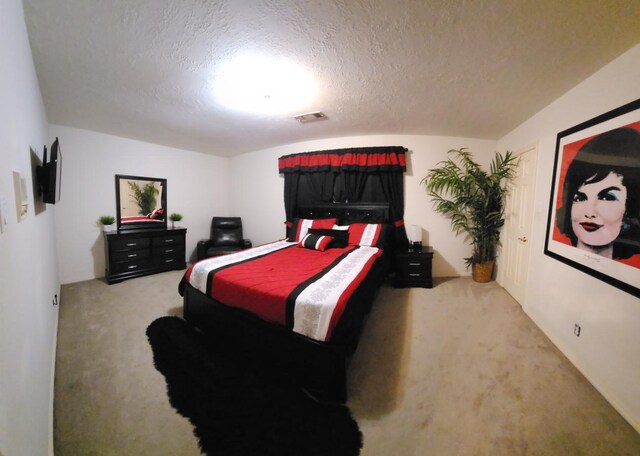 3226 Blackcastle Dr, Houston, TX 77068 - bedroom with a textured ceiling, visible vents, and carpet floors