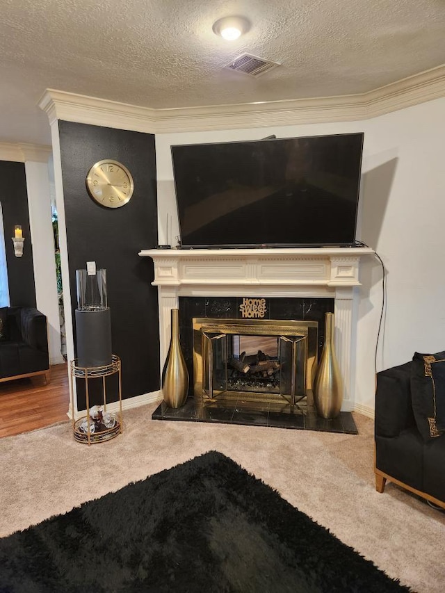 3226 Blackcastle Dr, Houston, TX 77068 - interior details with visible vents, a fireplace, ornamental molding, and carpet floors