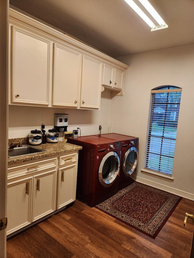 3226 Blackcastle Dr, Houston, TX 77068 - laundry room with washing machine and clothes dryer, cabinet space, a sink, and dark wood finished floors