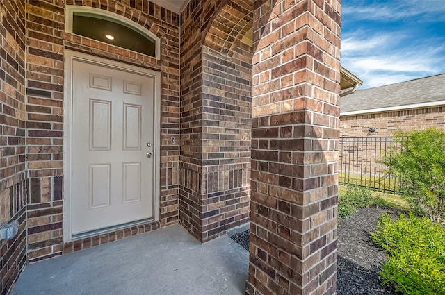 2203 Manila, Texas City, TX 77568 - entrance to property featuring brick siding and fence