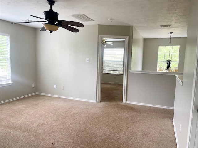 15318 Redbud Berry Way, Cypress, TX 77433 - carpeted empty room with visible vents, baseboards, and a ceiling fan