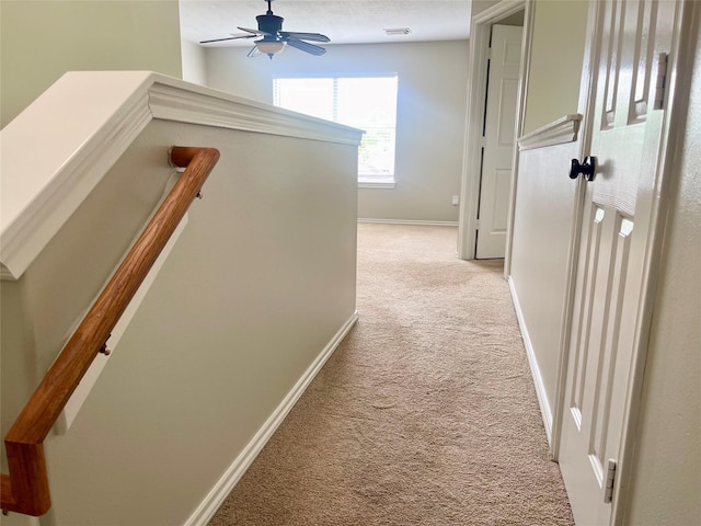 15318 Redbud Berry Way, Cypress, TX 77433 - hall with visible vents, baseboards, an upstairs landing, and light carpet