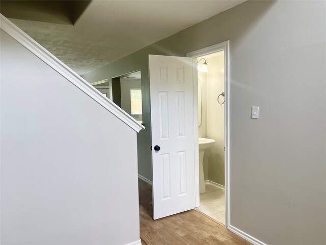 15318 Redbud Berry Way, Cypress, TX 77433 - stairway with baseboards and wood finished floors