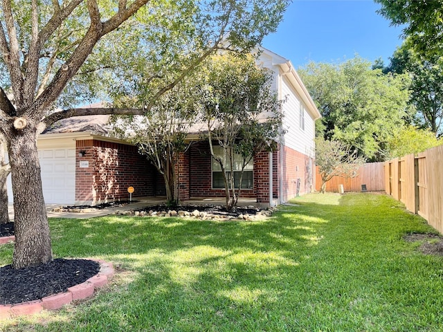 15318 Redbud Berry Way, Cypress, TX 77433 - view of front of house featuring brick siding, a front lawn, fence, and a garage