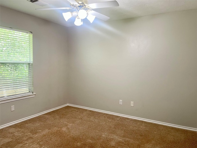 15318 Redbud Berry Way, Cypress, TX 77433 - empty room featuring carpet floors, baseboards, and a ceiling fan
