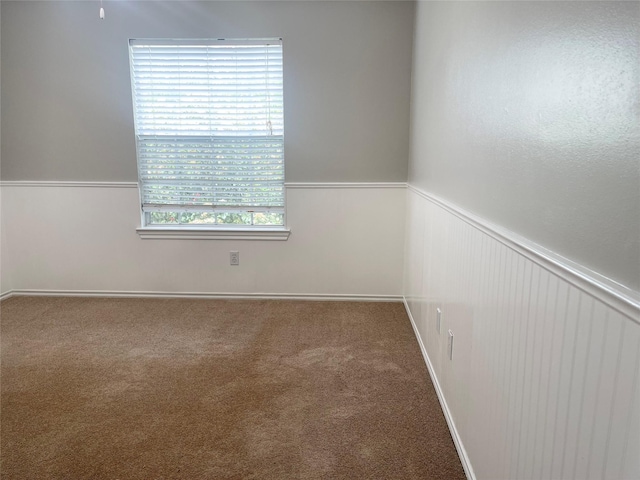 15318 Redbud Berry Way, Cypress, TX 77433 - unfurnished room with carpet flooring and a wainscoted wall
