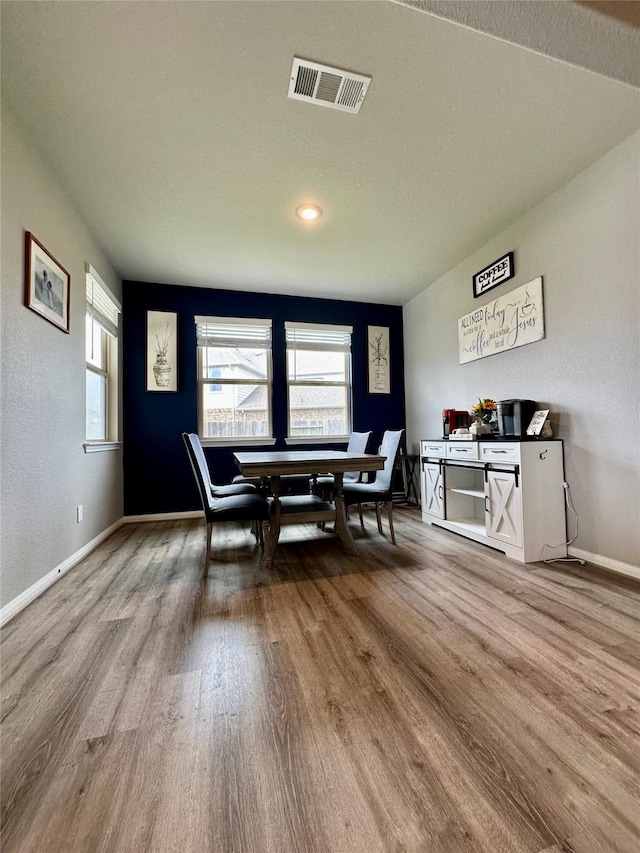 31503 Sandpiper Creek Dr, Hockley, TX 77447 - dining room with wood finished floors and baseboards