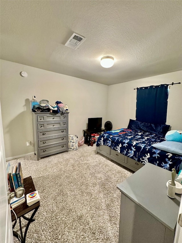 31503 Sandpiper Creek Dr, Hockley, TX 77447 - carpeted bedroom featuring a textured ceiling