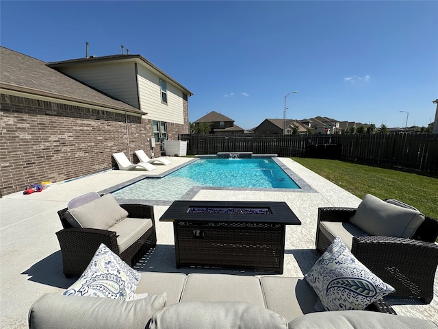 31503 Sandpiper Creek Dr, Hockley, TX 77447 - view of pool with an outdoor living space with a fire pit and a patio