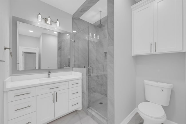 3007 E Ebano Ave, Hidalgo, TX 78557 - bathroom featuring a marble finish shower, vanity, and marble finish flooring