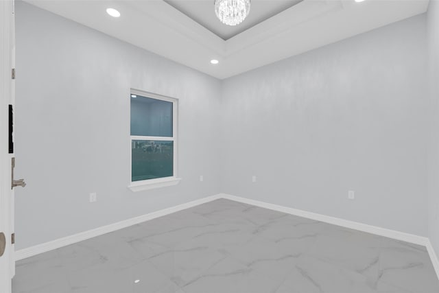 3007 E Ebano Ave, Hidalgo, TX 78557 - empty room featuring marble look tile flooring, recessed lighting, and a chandelier