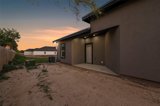3007 E Ebano Ave, Hidalgo, TX 78557 - yard at dusk with a patio