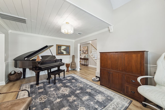 sitting room featuring light wood finished floors and visible vents