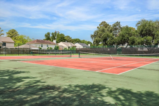 view of sport court with community basketball court and fence