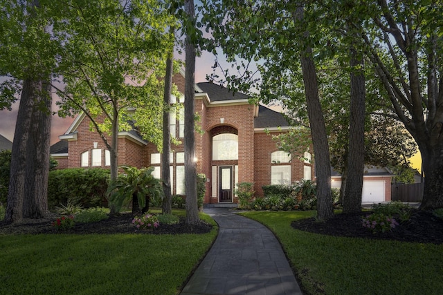 19402 Bremerton Ln, Spring, TX 77388 - view of front of property featuring brick siding, a front lawn, roof with shingles, and a garage