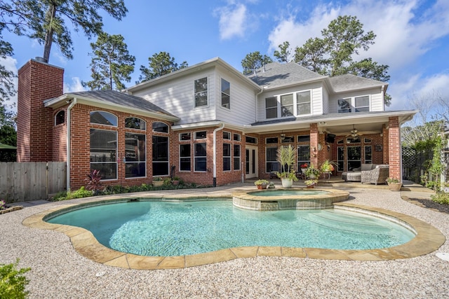 19402 Bremerton Ln, Spring, TX 77388 - view of pool featuring ceiling fan, fence, a patio, and a pool with connected hot tub