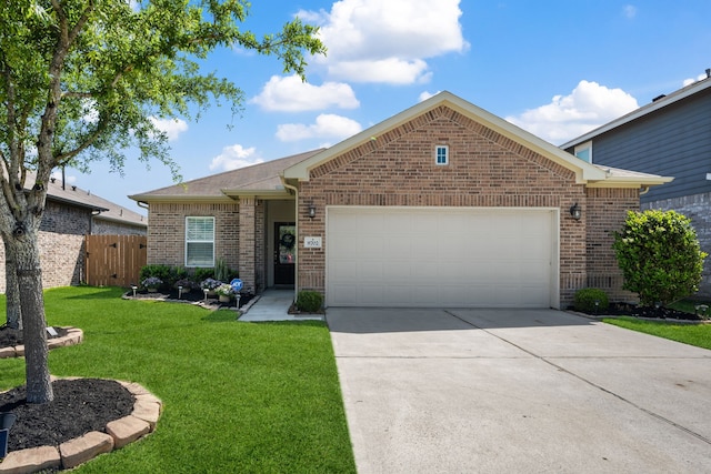 ranch-style home with a garage, concrete driveway, fence, a front yard, and brick siding