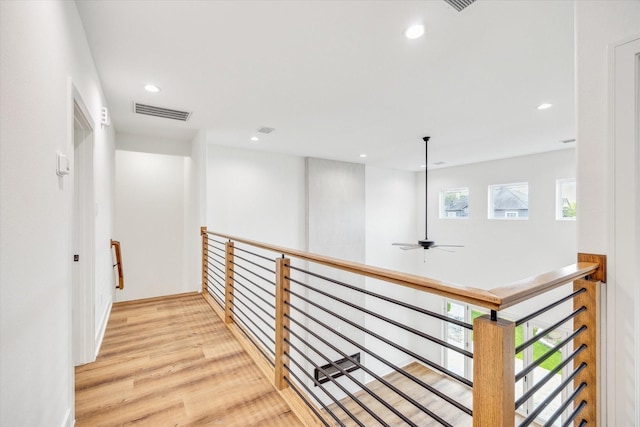 3314 Arbor, Houston, TX 77004 - corridor featuring recessed lighting, wood finished floors, and an upstairs landing