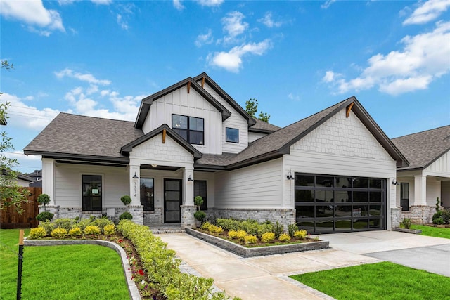 3314 Arbor, Houston, TX 77004 - view of front facade with a shingled roof, a garage, driveway, a front lawn, and board and batten siding