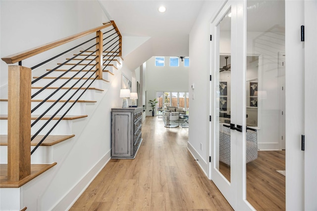 3314 Arbor, Houston, TX 77004 - foyer featuring wood finished floors, recessed lighting, stairway, and baseboards