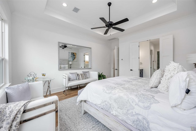 3314 Arbor, Houston, TX 77004 - bedroom with a tray ceiling, recessed lighting, wood finished floors, a ceiling fan, and ensuite bath