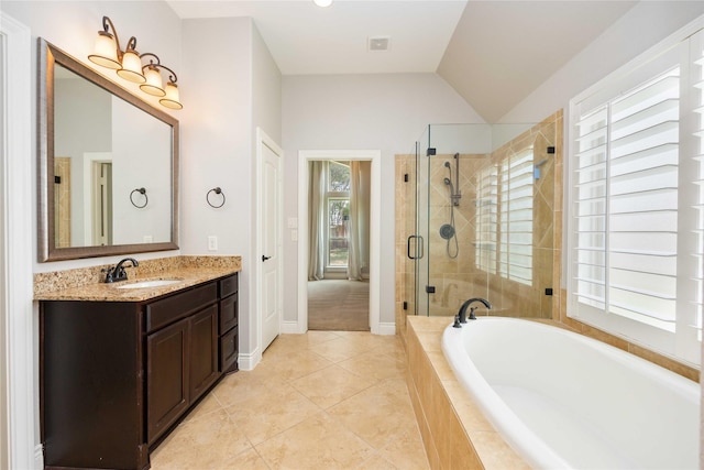 2423 Rosillos Peak Dr, Spring, TX 77386 - bathroom with a shower stall, a bath, tile patterned flooring, vanity, and vaulted ceiling