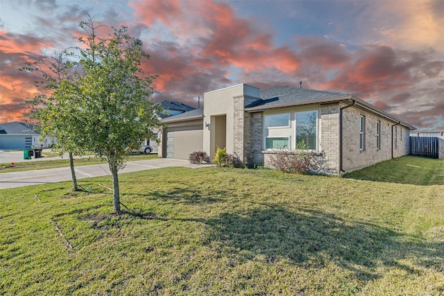 29607 Ella Larchmont Ct, Katy, TX 77494 - view of front facade with a yard, an attached garage, fence, concrete driveway, and brick siding
