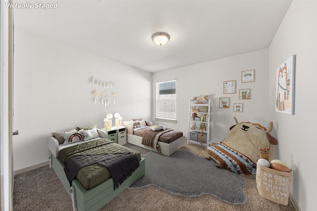 29607 Ella Larchmont Ct, Katy, TX 77494 - bedroom featuring baseboards and carpet floors