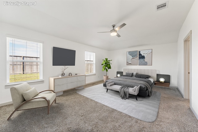29607 Ella Larchmont Ct, Katy, TX 77494 - carpeted bedroom featuring visible vents, baseboards, and ceiling fan