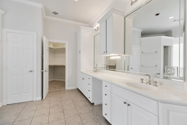 full bath with double vanity, visible vents, a sink, and ornamental molding