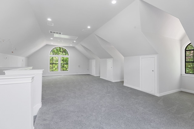 bonus room with visible vents, recessed lighting, carpet flooring, and vaulted ceiling