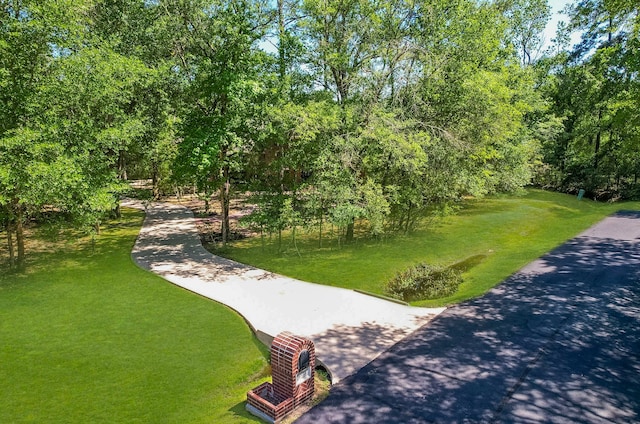 surrounding community with a yard