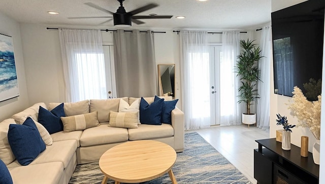 3703 Peppermill Rd, Houston, TX 77080 - living area with ceiling fan, wood finished floors, and recessed lighting