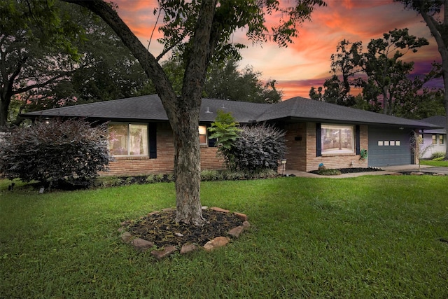 3703 Peppermill Rd, Houston, TX 77080 - single story home with brick siding, an attached garage, a yard, driveway, and a shingled roof