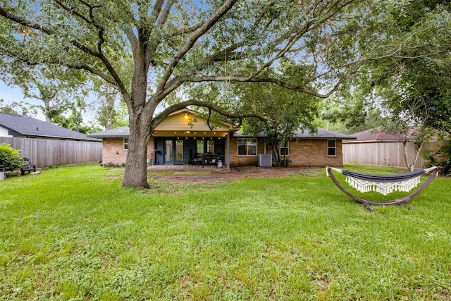 3703 Peppermill Rd, Houston, TX 77080 - back of house with brick siding, central AC, and a patio