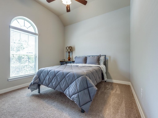 2054 Brookmont Dr, Conroe, TX 77301 - carpeted bedroom featuring multiple windows, lofted ceiling, baseboards, and a ceiling fan