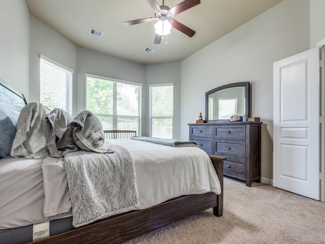 2054 Brookmont Dr, Conroe, TX 77301 - bedroom featuring light carpet and ceiling fan
