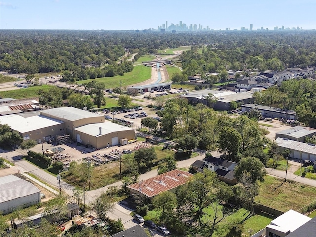 birds eye view of property with a view of city