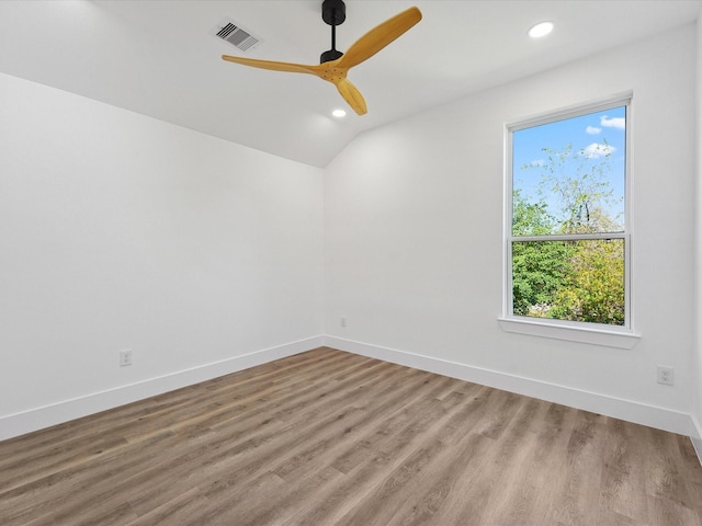 empty room with recessed lighting, visible vents, wood finished floors, and ceiling fan