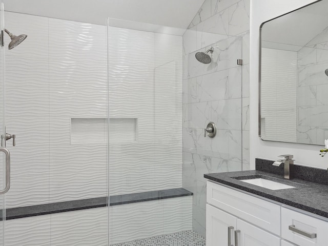 full bath featuring a shower stall and vanity