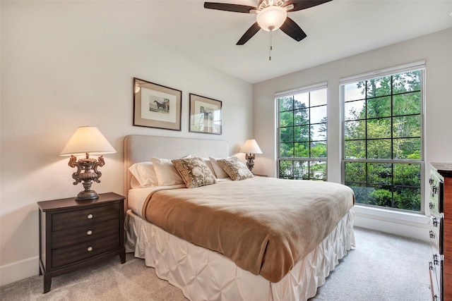 404 Christians Ct, Montgomery, TX 77316 - bedroom with light colored carpet and ceiling fan