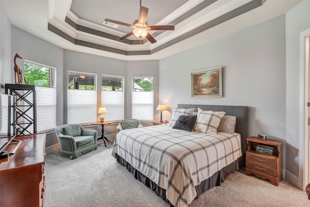 404 Christians Ct, Montgomery, TX 77316 - bedroom featuring a tray ceiling, visible vents, a ceiling fan, and light carpet