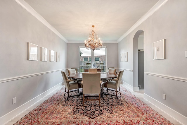 404 Christians Ct, Montgomery, TX 77316 - dining space featuring arched walkways, a chandelier, crown molding, and baseboards