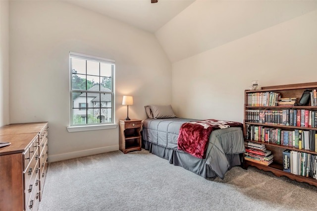 404 Christians Ct, Montgomery, TX 77316 - bedroom featuring carpet floors, vaulted ceiling, and baseboards