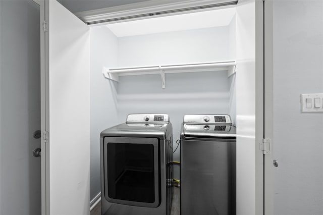 laundry room with laundry area and separate washer and dryer