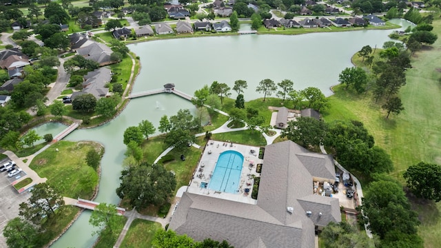 aerial view with a residential view and a water view